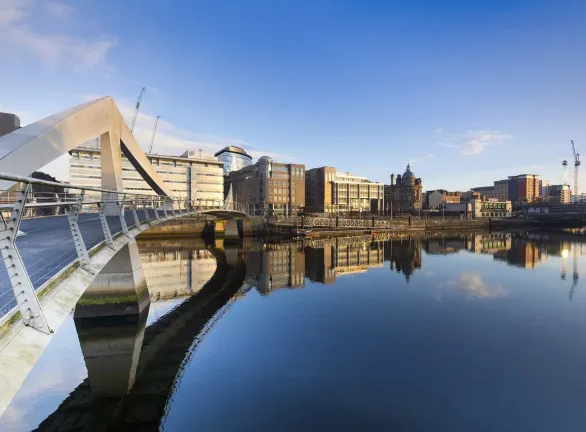 Bridge over River Clyde in Glasgow, Scotland, showcasing stunning architecture and scenic views.